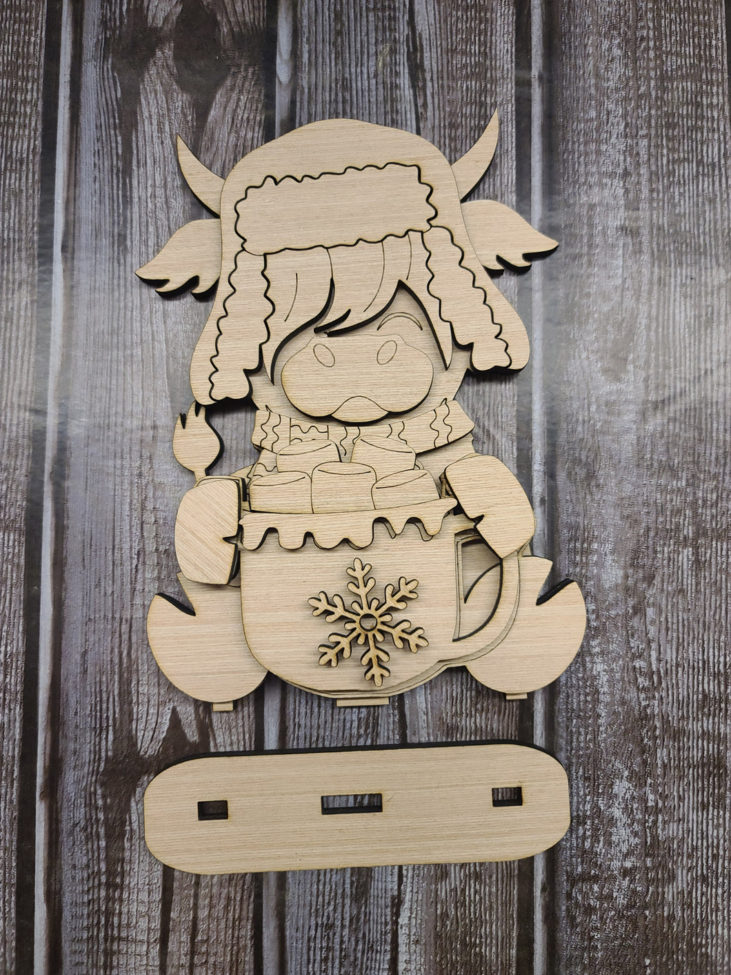 Highland cow with a mug of cocoa DIY kit