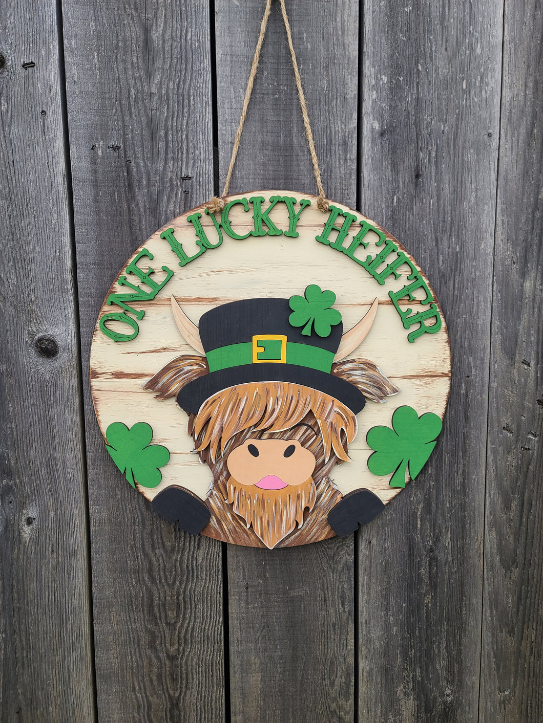 One lucky heifer highland cow door hanger