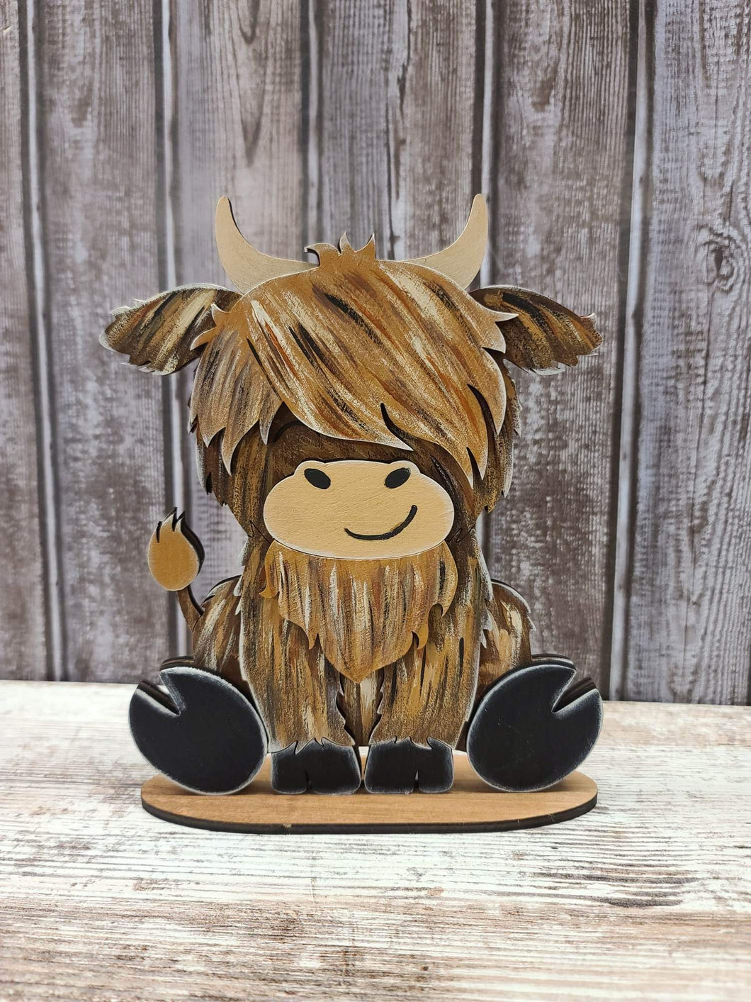 Highland cow sitter