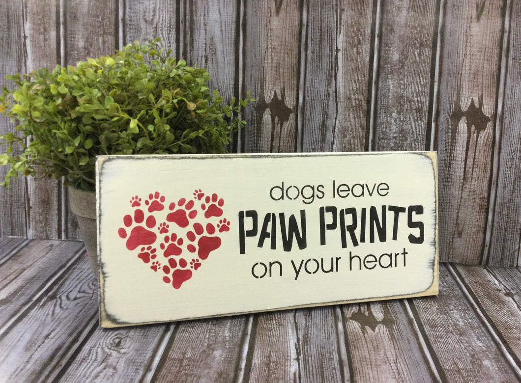 Dogs leave paw prints on your heart sign